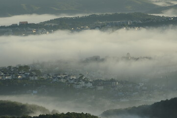 Wall Mural - town of the fog with magic light and tranquility scenery