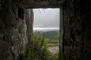 Old abandoned bunker in the woods. Military Fort. Fort Suvorov, Vladivostok, Russia.