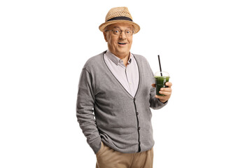 Elderly man holding a healthy green smoothie in a plastic cup