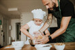 © Gala Martínez López/Westend61 - Father and daughter baking cookies at home