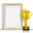 © Rizky - Realistic golden trophy with empty picture frame wooden design