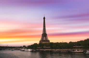 Wall Mural - Sunset over the the Eiffel Tower and the Seine River in Paris, France.