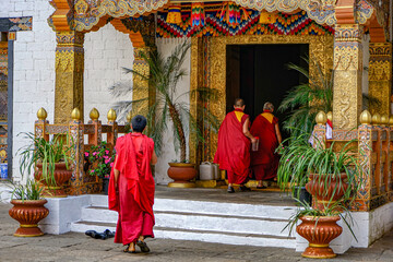 Wall Mural - Bhutan, Thimphu -   Buddhist monks in traditional robes at the Trashi Chhoe Dzong