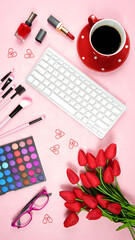 Wall Mural - Beauty makeup shopping feminine pink red theme bloggers desktop workspace with keyboard and accessories on stylish pink textured background. Top view blog hero header creative composition flat lay.