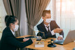 © aekachai - Male lawyer or judge wearing  protective mask on the consult having team meeting with client, Law and Legal services concept