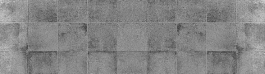 Seamless grunge grey gray anthracite square mosaic concrete cement stone wall tiles pattern texture wide background banner panoramic panorama
