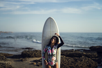 Sticker - Caucasian woman during the surfing in the sea