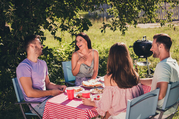 Canvas Print - Four nice attractive glad excited best buddy fellow cheerful cheery guys group meeting talking eating lunch spending weekend laughing pastime fresh air sunny day weather having fun