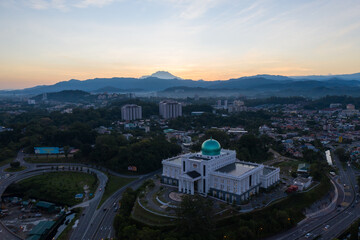 Canvas Print - Aerial drone image of morning sunrise view in Kota Kinabalu City, Sabah, Malaysia