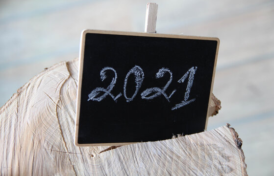 Hand drawn New Year pattern, blackboard Clipart Image. Handwritten by chalk number of New year 2021 Wood background. Black and white.
