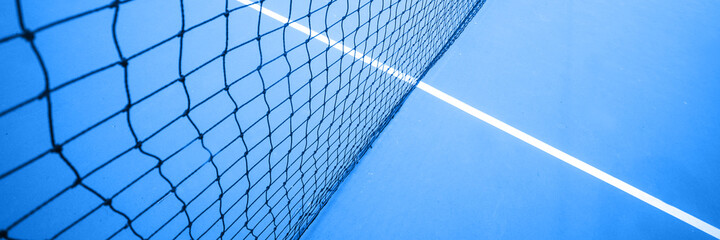 Tennis net on the tennis court. Selective focus