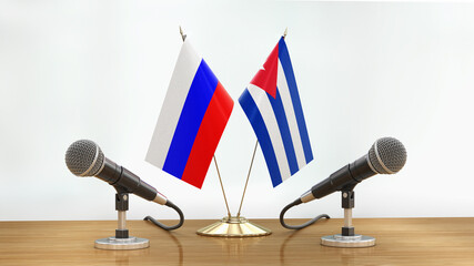 Poster - Microphones and flags pair on a desk over defocused background