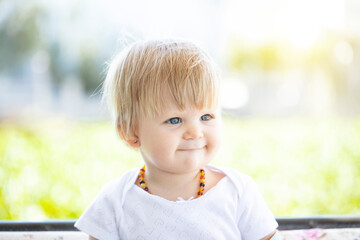 happy cute baby. blond baby girl.