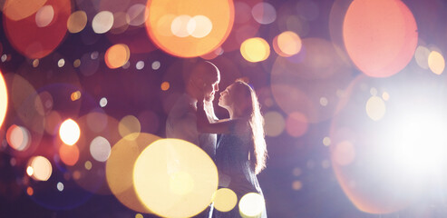 Romantic Lovers couple against background night city, sky star. Concept romance date Valentine Day, first kiss love