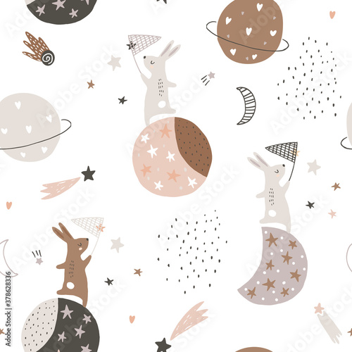 Fotografering Seamless childish pattern with catching stars cute bunnies characters, planets, moon, stars