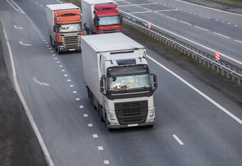 Canvas Print -  trucks goes on the highway