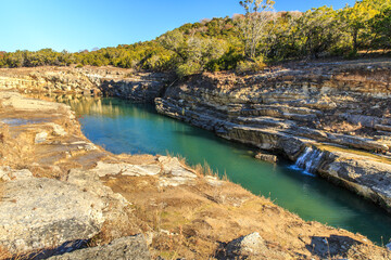 Canyon Lake Gorge formed in 2002 after many inches of rain fell and washed out the land. Just outside of New Branfels, Texas the gorge has uncovered dinosaur tracks, fossils,  interesting geologically