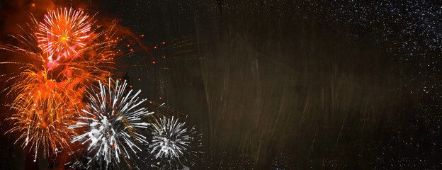 Wall Mural - fireworks on brown-black blackboard with space for text