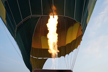 Wall Mural - Blowing gas in colorful hot air balloon