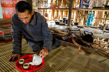 Farmer in a traditional poor Farmhouse in the Bac Son Valley in Vietnam