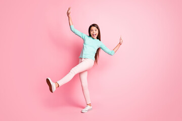 Sticker - Full body size photo of cute lovely little latin lady long hairdo dance retro disco raise hands up legs wear turquoise sweatshirt pants white sneakers isolated pink color background