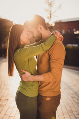 Poster - Photo of passionate couple girl guy soulmate hug cuddle in autumn fall town park wear turtleneck sweater