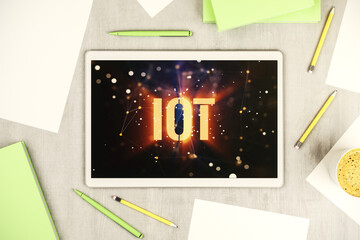 Poster - Modern digital tablet monitor with creative IOT hologram, research and development concept. Top view. 3D Rendering