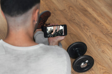 boy learning with technology in the gym