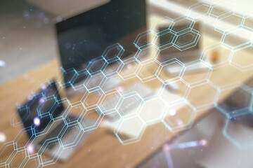 Poster - Creative abstract wireless technology hologram with hexagon and modern desktop with pc on background, artificial intelligence and machine learning concept. Multi exposure