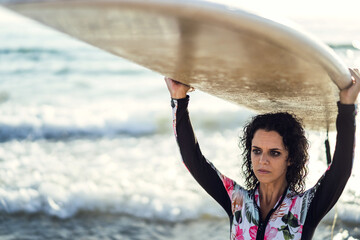 Sticker - Female and her surfboard by the ocean