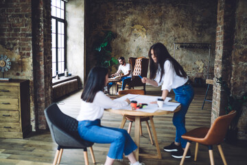 Wall Mural - Casual female colleagues working on startup project