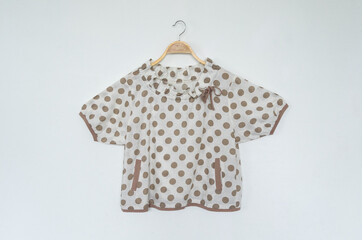 woman clothes polka dot blouse on white background