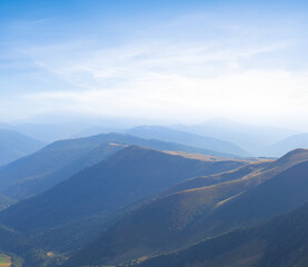  mountain ridge in a blue mist, outdoor mountain travel background