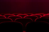 Fototapeta Miasta - Empty cinema hall with red seats. Movie theatre