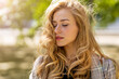 © pikselstock - Portrait of attractive young woman outdoors