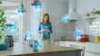 © Gorodenkoff - Internet of Things Concept: Young Woman Using Smartphone in Kitchen. She controls her Kitchen Appliances with IOT. Graphics Showing Digitalization Visualization of Connected Home Electronics Devices