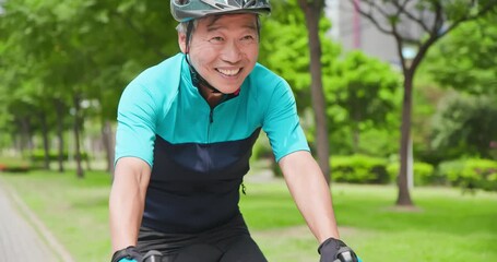 Wall Mural - Asian old man cycling bicycle