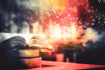 Wall Mural - Open book on the table and english alphabet floating above the book in the library and blurred bookshelf background. education background. back to school concept.