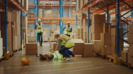 Wall Mural - Warehouse Worker Has Work Related Accident Falls while Trying to Pick Up Cardboard Box from the Shelf. Colleagues Call for Help and Medical Assistance. Injury at Work. Slow Motion