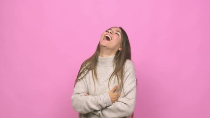 Wall Mural - Young cute woman laughing and having fun