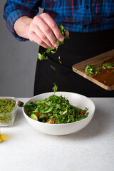 Canvas Print - Cooking vegan food, salad in large bowl