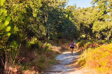 woman running in the forest