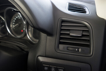 Air conditioner vent grill in a modern car