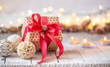 Beautiful Christmas Background With Christmas Toys And A Gift Box.