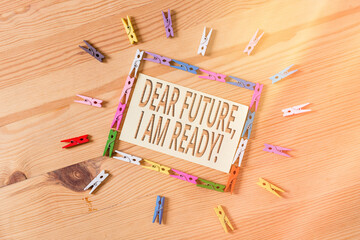 Wall Mural - Word writing text Dear Future I Am Ready. Business photo showcasing Confident to move ahead or to face the future Colored clothespin papers empty reminder wooden floor background office