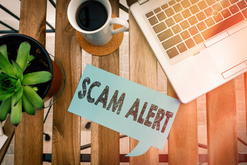 Poster - Word writing text Scam Alert. Business photo showcasing unsolicited email that claims the prospect of a bargain Paper accesories with digital smartphone arranged on different background