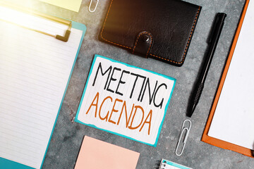 Fototapete - Handwriting text Meeting Agenda. Conceptual photo items that participants hope to accomplish at a meeting Paper accesories with digital smartphone arranged on different background