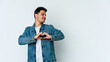 © Asier - Young caucasian man isolated on white background smiling and showing a heart shape with hands.