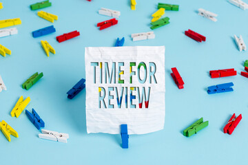 Wall Mural - writing note showing time for review. business concept for review of a system or situation in its fo