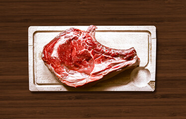 Wall Mural - Beef prime rib on a cutting board